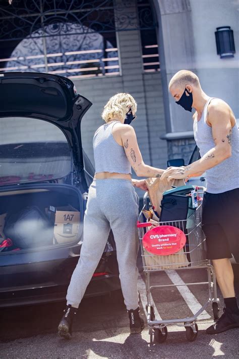 Miley Cyrus Sports A Mullet With No Bra On Shopping Trip With Cody