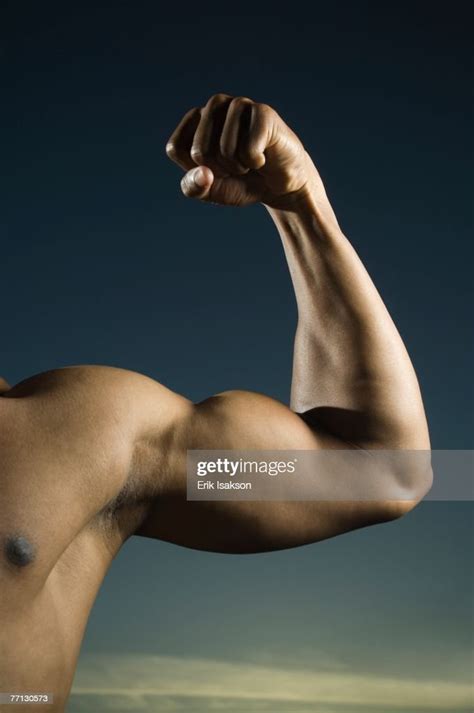 African American Man Flexing Biceps High Res Stock Photo Getty Images