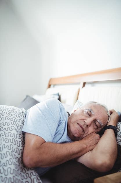 Premium Photo Senior Man Sleeping On Bed