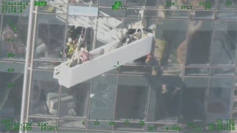 2 Rescued From 18 Story Building After Scaffolding Spins Out Of Control