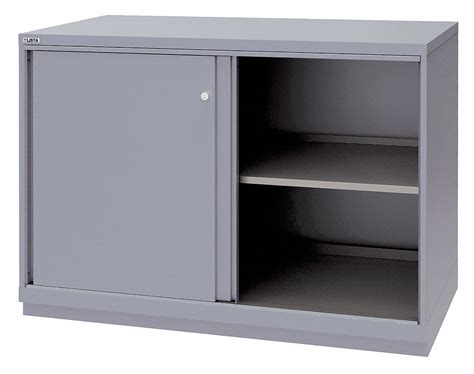 Imagine no more getting on your hands and knees to reach the items you store throughout your home. LISTA Base Cabinet, Sliding Doors, 56-1/2"W x 28-1/2"D x ...
