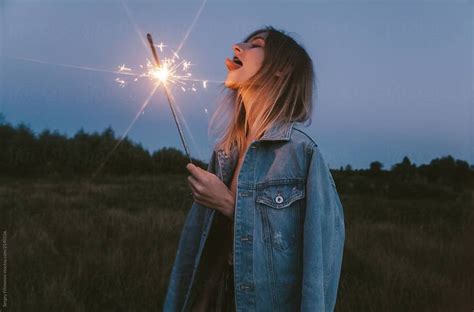 View Sexy Woman With Sparkler By Stocksy Contributor Sergey