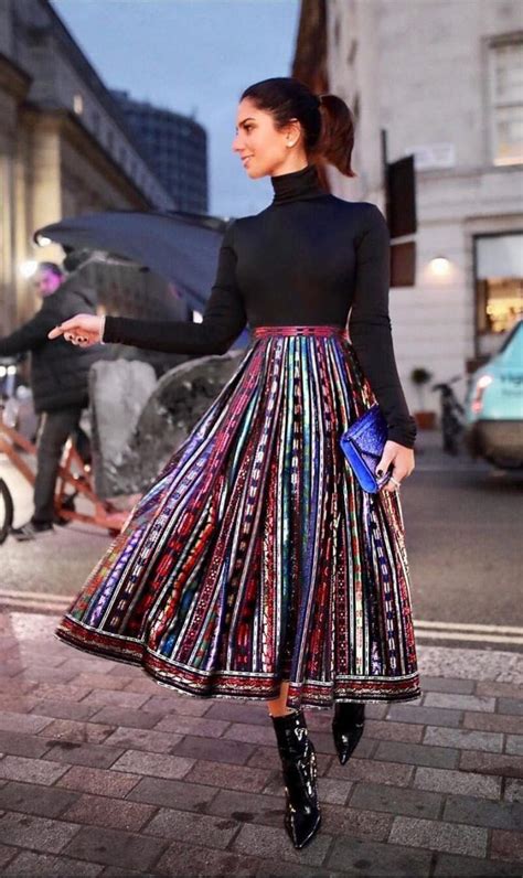 How To Wear A Pleated Skirt Printed Skirt And Turtleneck Via