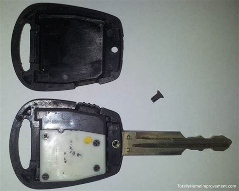 • insert a slim tool into the slot and gently pry open the remote key cover. DIY Hyundai Getz Key Fob Battery Replacement | Hyundai ...