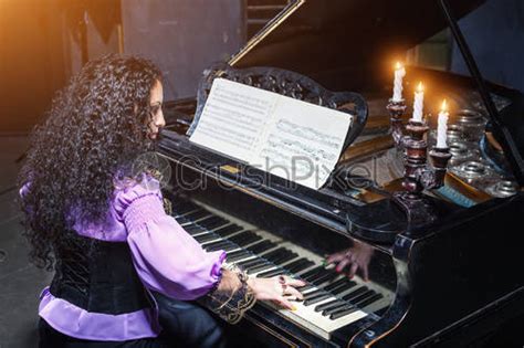 Woman Playing The Piano Stock Photo Crushpixel
