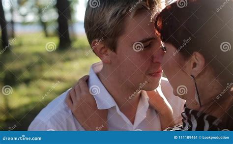 Young Lovely Couple Kissing In A Park Stock Video Video Of Slowmotion