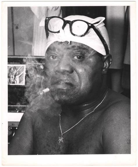 Louis Armstrong american trumpeter, composer, vocalist, and actor smoking cigar and cigarette ...