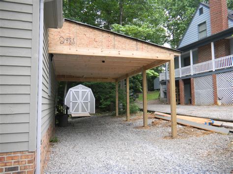 A carport garage is one that is supported on poles rather than by walls. Carport - RBM Remodeling Solutions, LLC