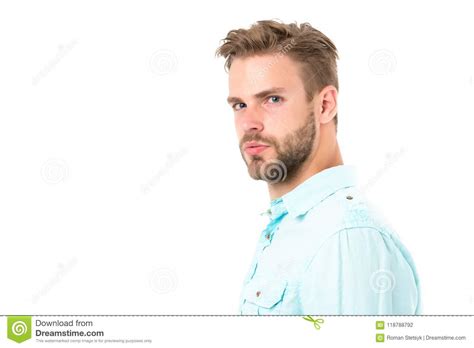 metrosexual concept man bristle serious strict face looks back isolated white man beard