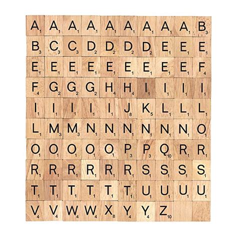 The 100 Tiles Alphabet Of The Wooden Pieces For Word Scrabble Game