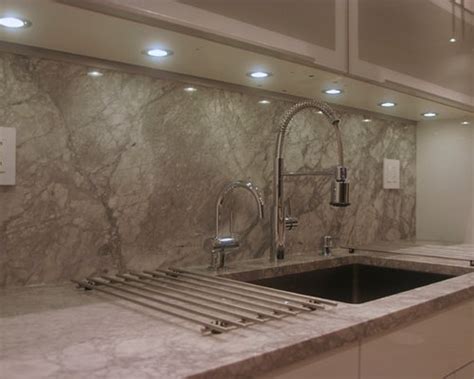 When integrated thoughtfully, black cabinets can. Quartz Countertop Under Cabinet Lighting | Houzz