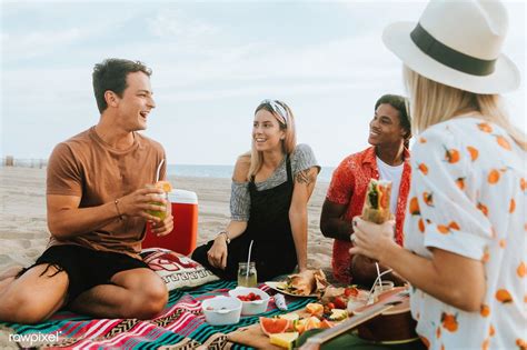 Download Premium Image Of Friends Eating Food At A Beach Picnic 517079 In 2020 Beach Picnic