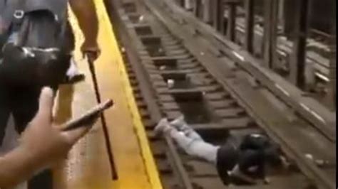 Hurry Up Ny Subway Passenger Collapsed On Tracks Is Rescued Moments Before Train Arrives