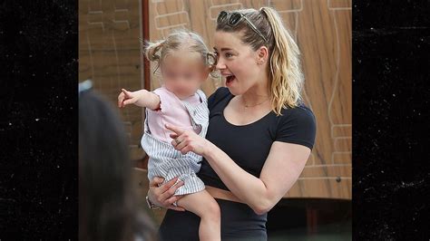 Amber Heard Hangs With Daughter In Madrid After Quitting Hollywood