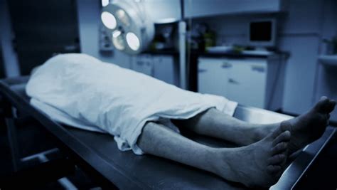Dead Male Body Laid Out On An Autopsy Table Stock Footage Video 5820236
