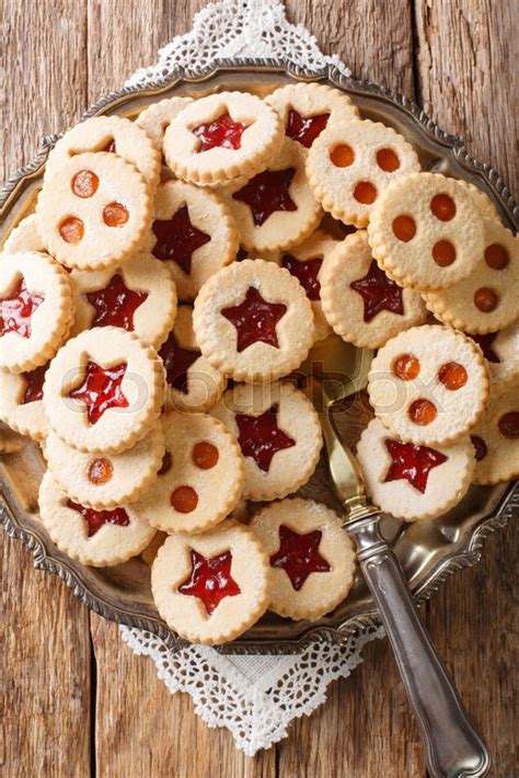 Baking cookies is one of the big traditions in this season and families get together and spend a weekend creating delicious cookies from scratch. Traditional Austrian christmas cookies ... | Stock image | Colourbox