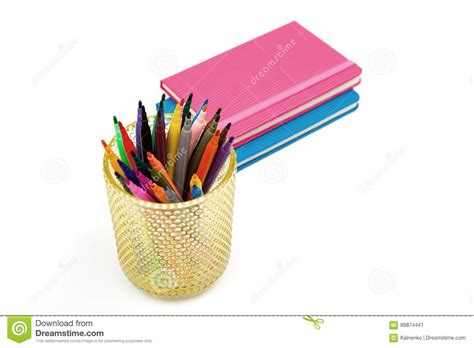 Notebook And Multicolored Markers On A White Background Stock Image