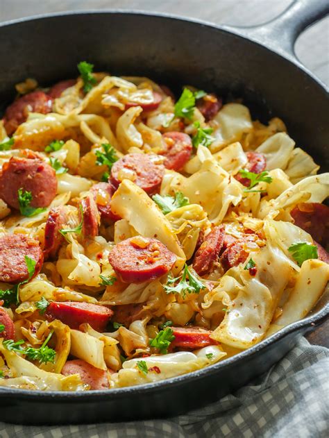 Often, the simplest things are the most satisfying, especially when it comes to making a delicious lunch or dinner. Fried Cabbage and Kielbasa Skillet - 12 Tomatoes in 2020 ...