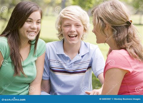 Teenagers Sitting And Conversing Stock Image Image Of Communication Cheerful