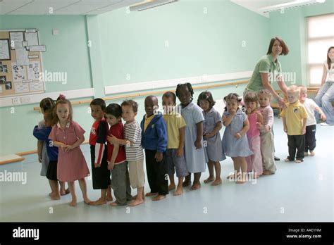 Preparatory Class School Children In Line Up With Teacher In Dance