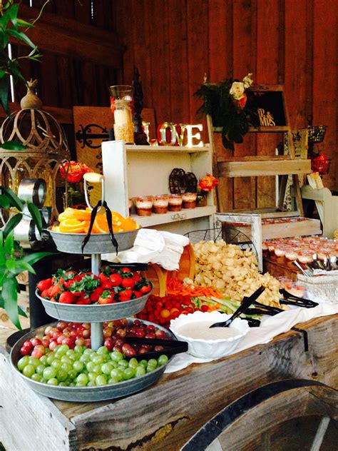 Fruit appetizers don't have to be complicated to be delicious. summer buffet table with fresh fruits … | Rustic party ...