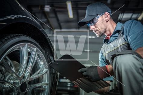In this event, there must be a guaranteed method of securing it in the перевод service position на русский. Auto Mechanic Job. Caucasian Car Service Technician with ...