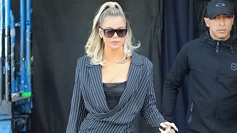 Khloe Kardashians Stripe Mini Dress Show Off Toned Legs Pics