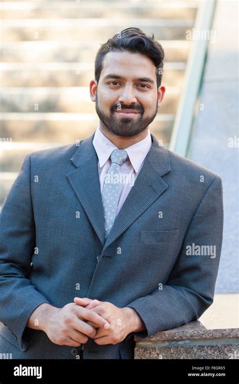 Indian Businessman Smiling Outdoors Stock Photo Alamy