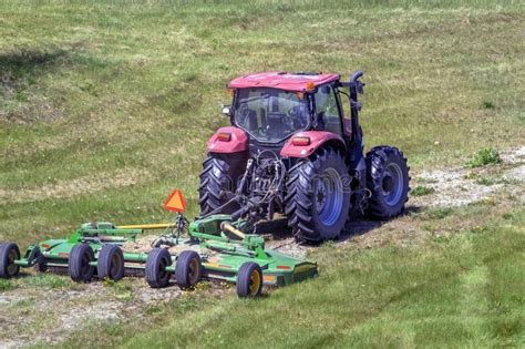 A Top View Of A Tractor Mowing Grass On A Public Space Editorial Stock