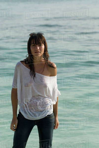 Babe Woman Wearing Wet Shirt At Beach Stock Photo Dissolve