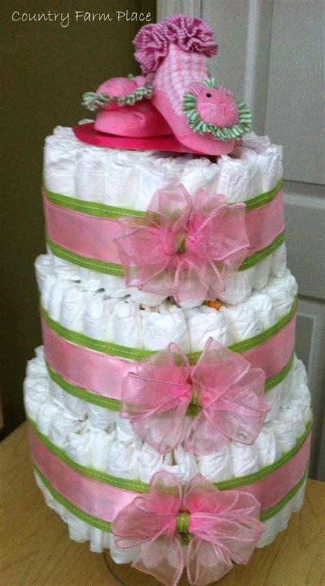 (3) white ribbon tied around the layers, (3) white 3in. Country Farm Place: DIY Diaper Cake
