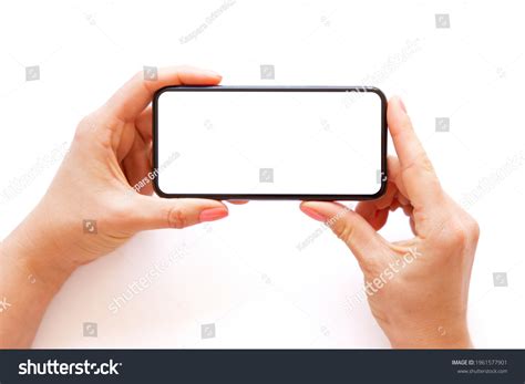 Person Holding Phone Horizontally Both Hands Stock Photo 1961577901