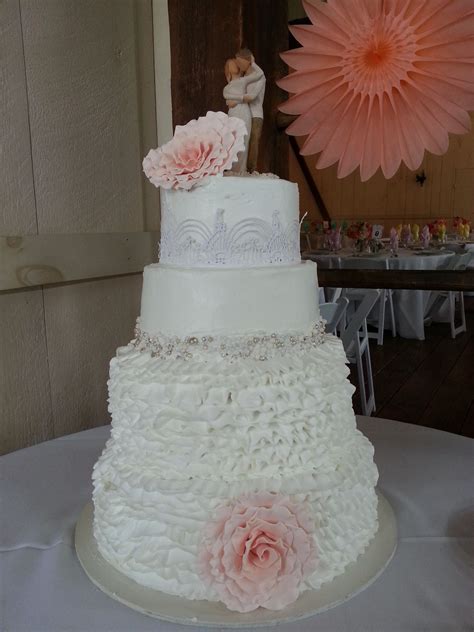 White Ruffle Pearl And Peach Flower Wedding Cake Wedding Cakes With