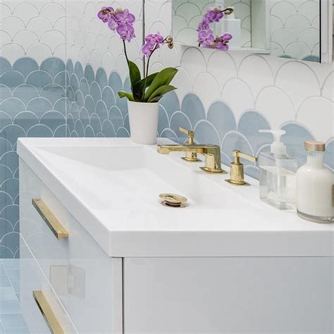 Check out our extensive range of bathroom sink vanity units and bathroom vanity units. Add This Blue, White, And Gold Bathroom To Your List Of ...