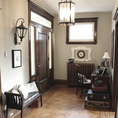 For the most harmonious look, choose wood furniture that matches the warmth of your floors but is a few. dark walnut trim gray walls | Dark Wood Trim and grey ...