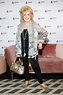 Patti Newton jazzes up old wardrobe staple with eye-popping accessories ...