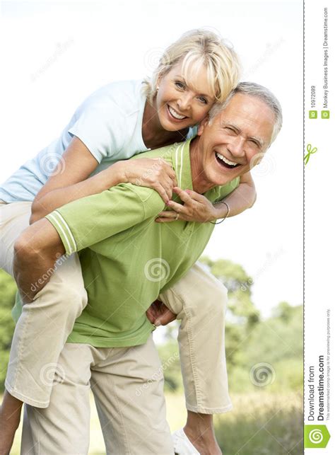 Mature Couple Having Fun In Countryside Royalty Free Stock