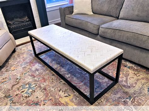It seats up to 6 people comfortably. DIY Edge Grain Plywood Herringbone Coffee Table - Addicted 2 Decorating®