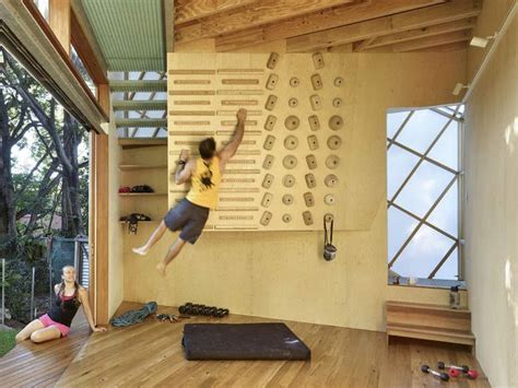 Treehouse Inspired Backyard Extension With An Indoor Climbing Wall