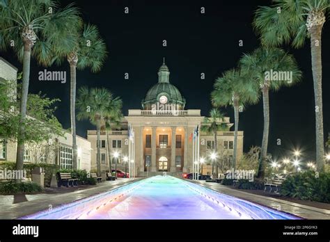 Evening photo of the historic Volusia County Courthouse and fountain