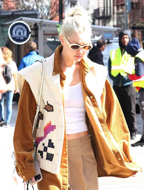 gigi hadid shows off platinum blonde hair and bleached eyebrows