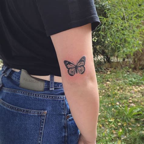 Butterfly Tattoo On Back Of Arm