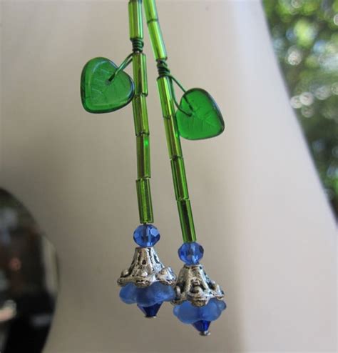 Items Similar To Graceful Blue Garden Flower Earrings On Etsy