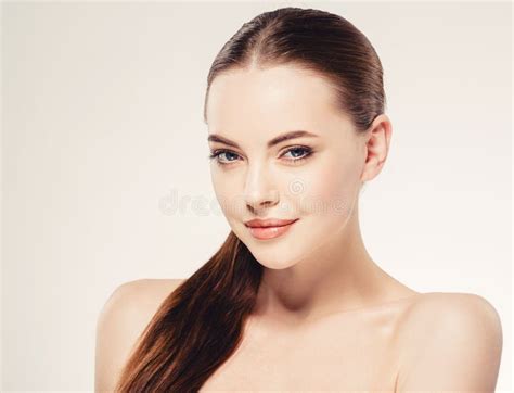 Young Beautiful Woman Face Portrait With Healthy Skin Stock Photo