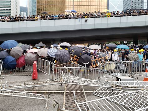 Hong Kong Police Call On Protesters Blocking Roads To Disperse Or Threaten Appropriate Force
