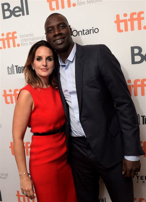 Omar sy reveals the meaning behind the fashion choices of 'lupin' after his swooning performance in the first part of the netflix hit , he instantly became a wanted man. Omar Sy and Helene Sy Photos Photos - 