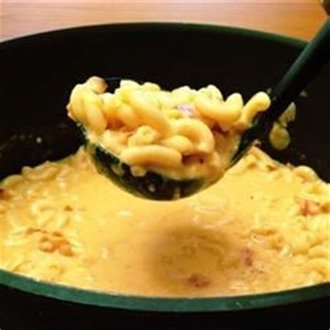 I also add 1/2 cup mild cheddar to the mix and 1/2 cup mild cheddar on top of the casserole, then add the bread crumbs. Mac and Cheese Soup Recipe - Allrecipes.com
