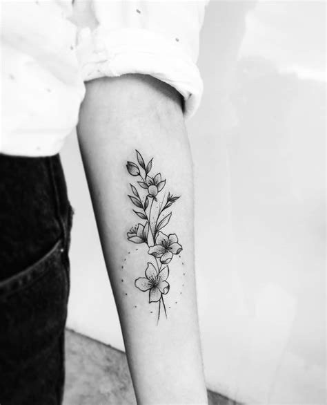 Dainty Flower Tattoo Ideas Photos