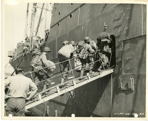 32nd Infantry Battalion Soldiers Climb Into Transport Ship For The