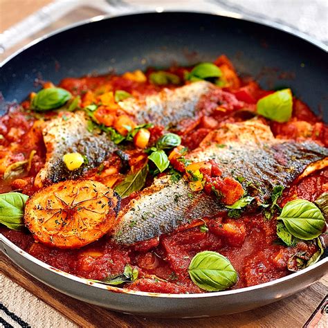 Easy One Pan Mediterranean Style Sea Bass With Tomatoes And Bell Peppers